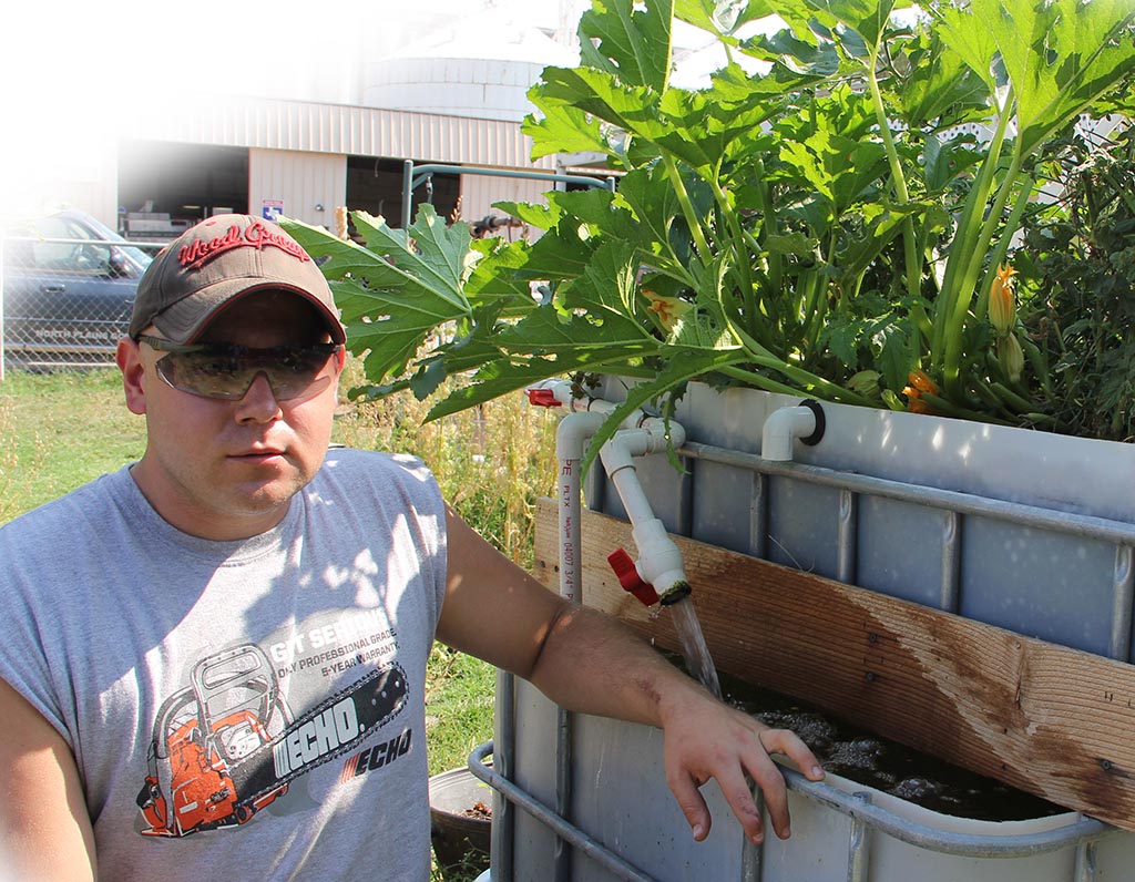 James Nelson shown here with his DIY aquaponics garden.